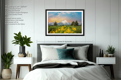 a bedroom with a bed and a picture hanging on the wall
