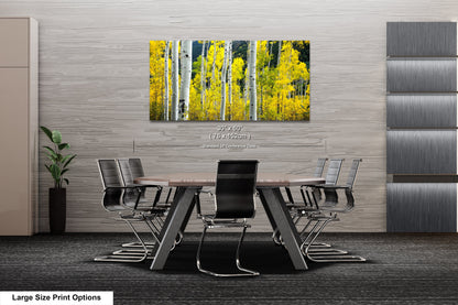 a dining room table with chairs and a painting on the wall
