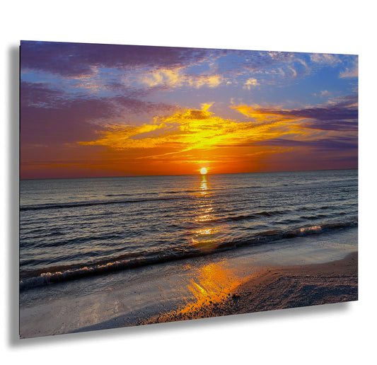 a picture of a sunset over the ocean
