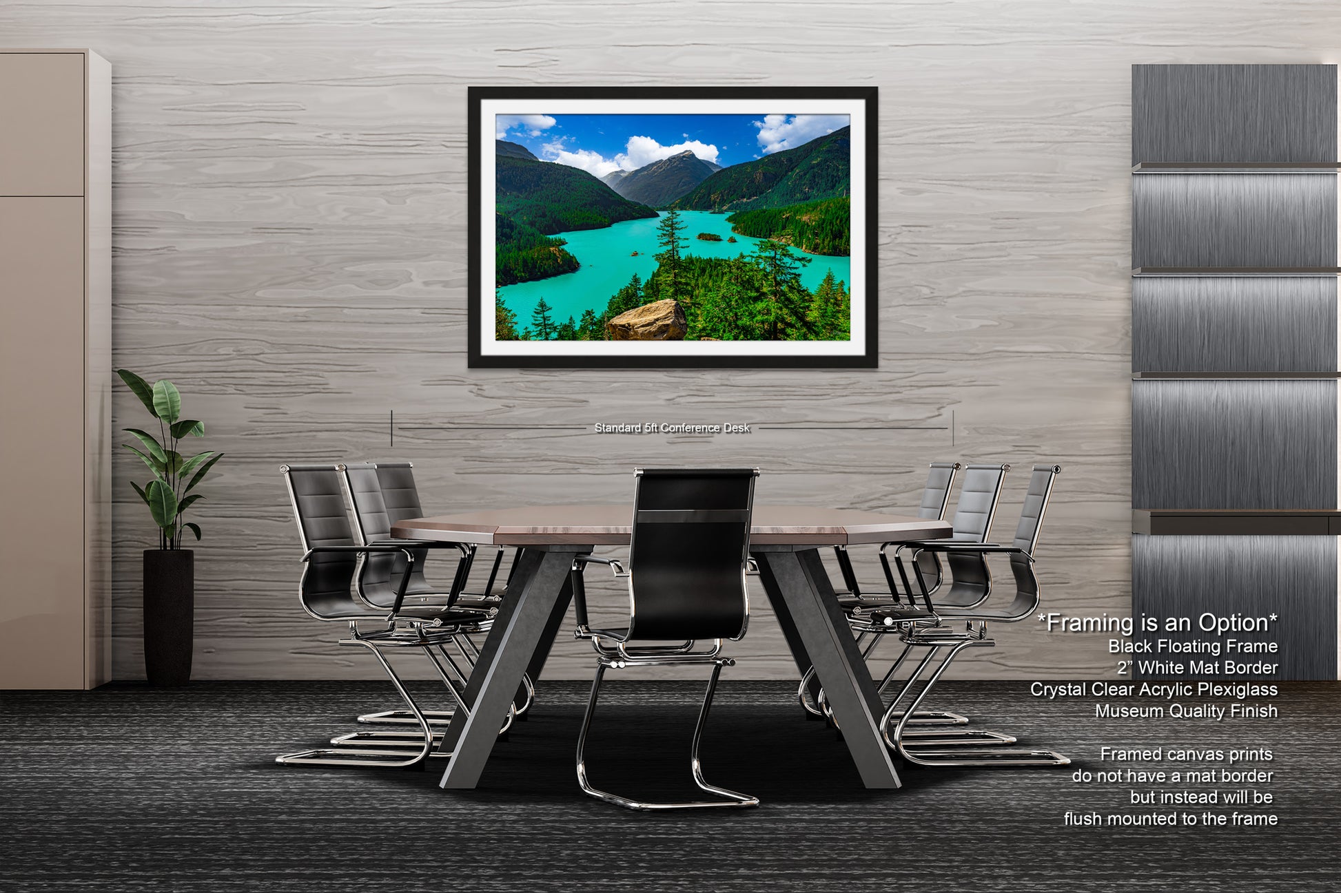 a modern office space with a large framed landscape painting hanging on the wall above a wooden table surrounded by black chairs.