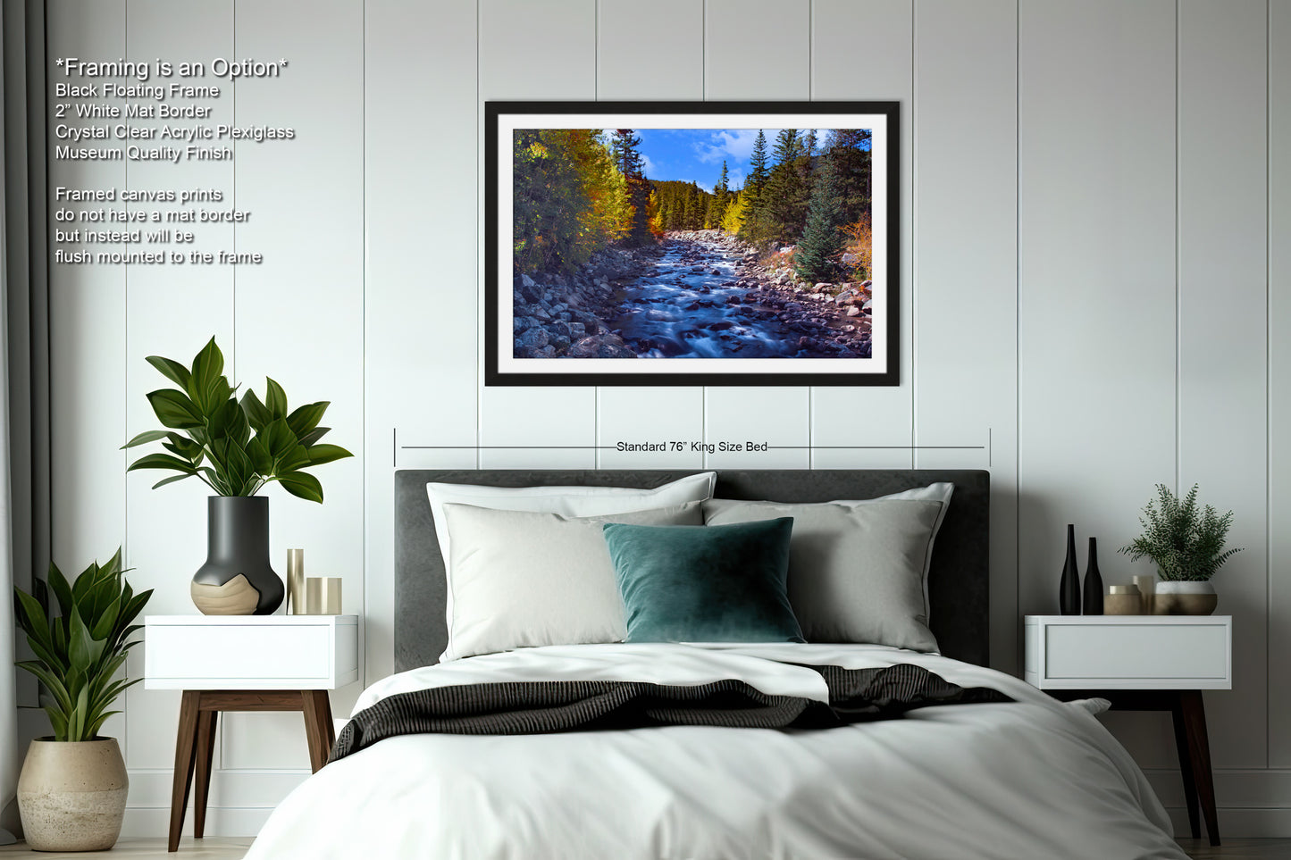 a bedroom with a bed and a picture hanging on the wall