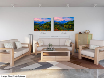 a living room with two paintings on the wall