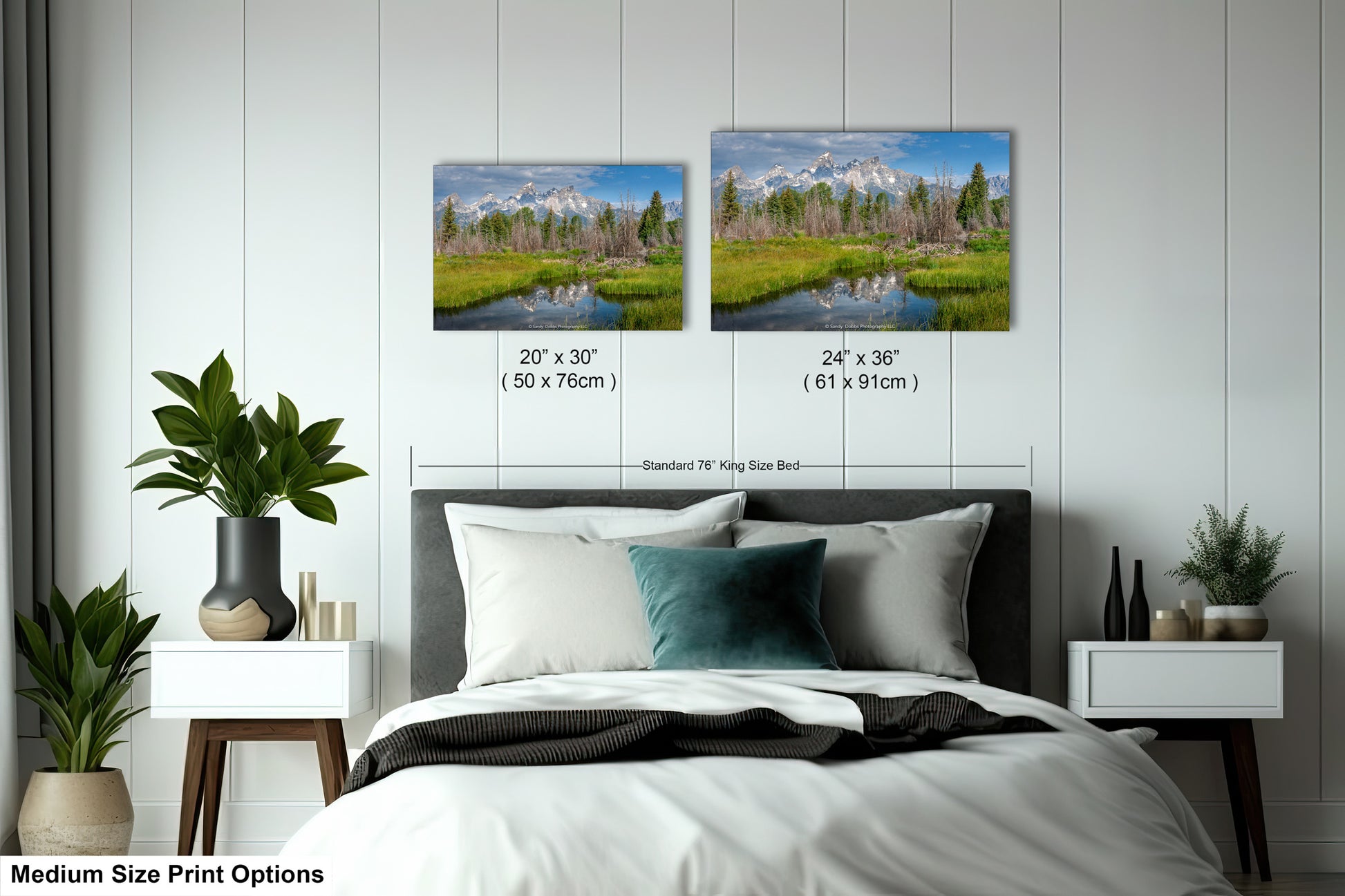 a bedroom with a bed and two pictures on the wall