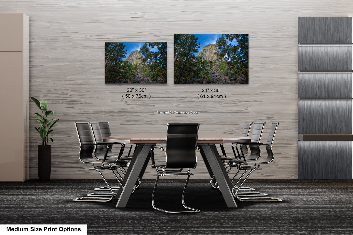 a dining room table with chairs and two pictures on the wall