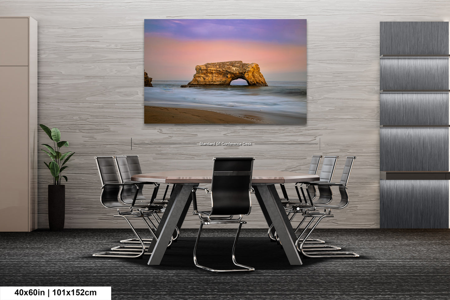 a dining room table with chairs and a painting on the wall