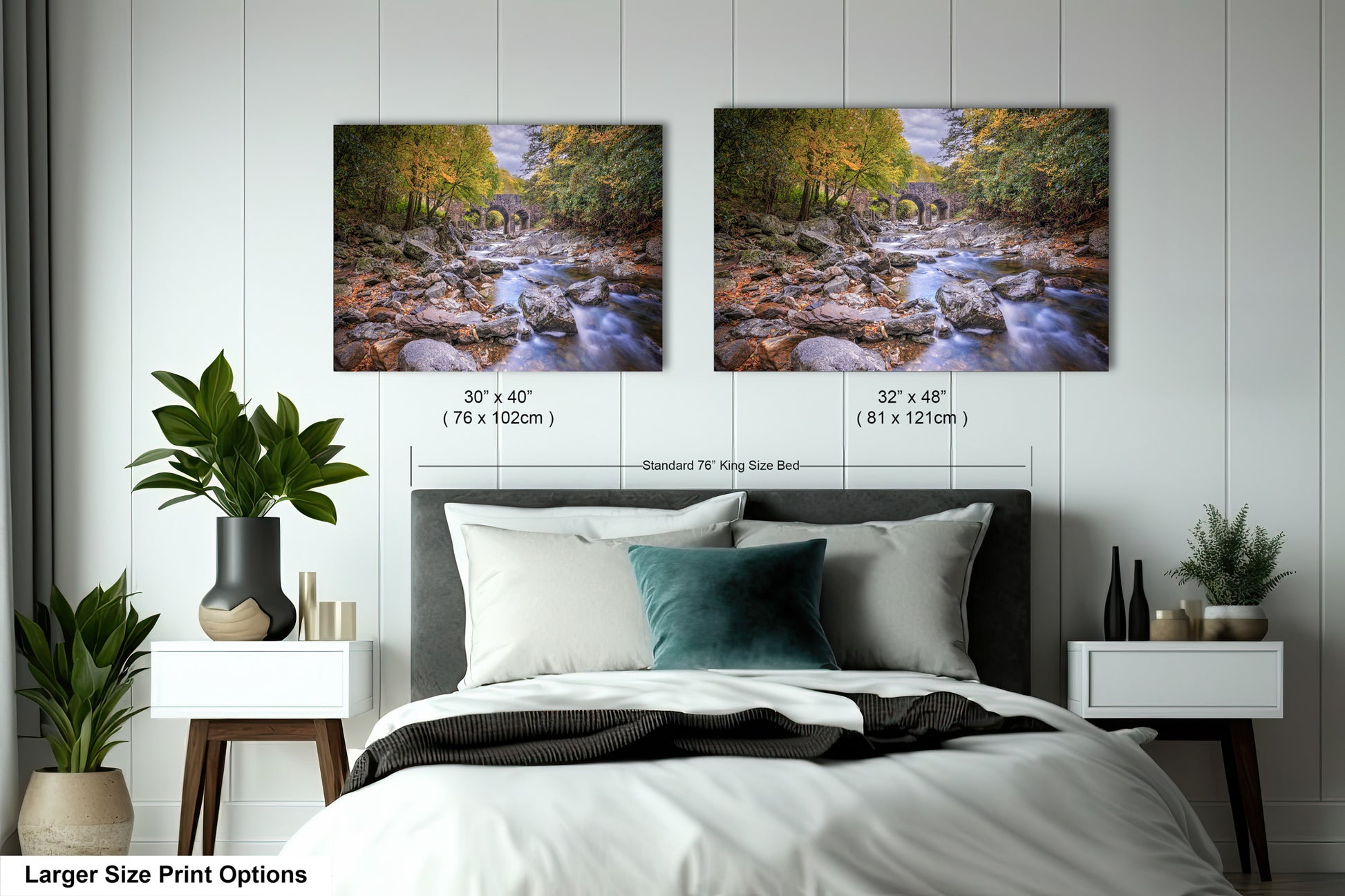 a bedroom with a bed and two pictures on the wall
