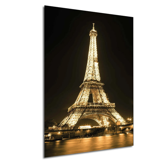 a picture of the eiffel tower lit up at night