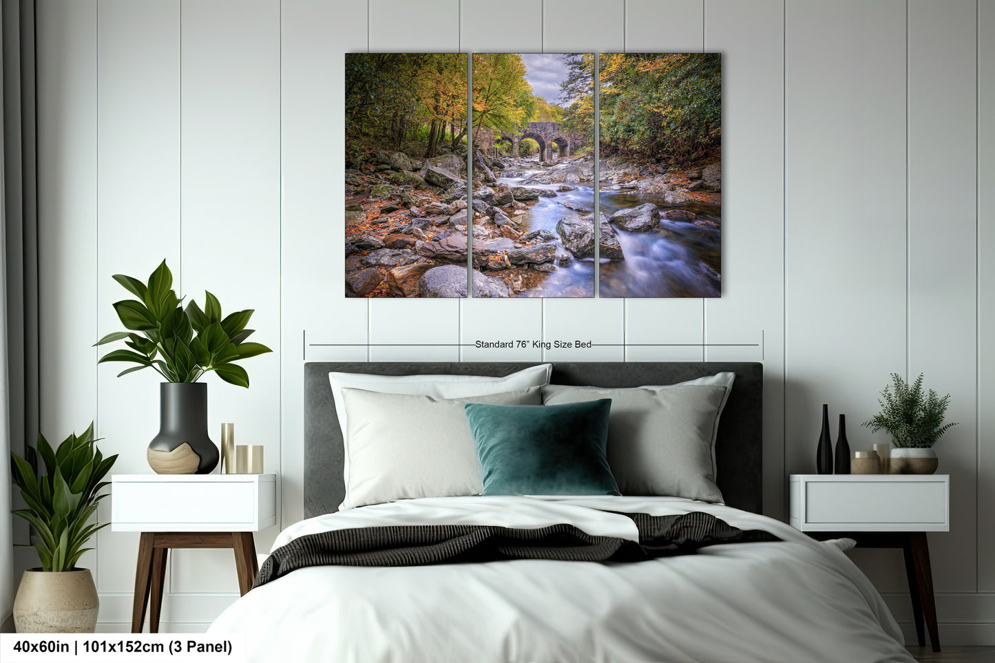 a bedroom with a bed and a painting on the wall