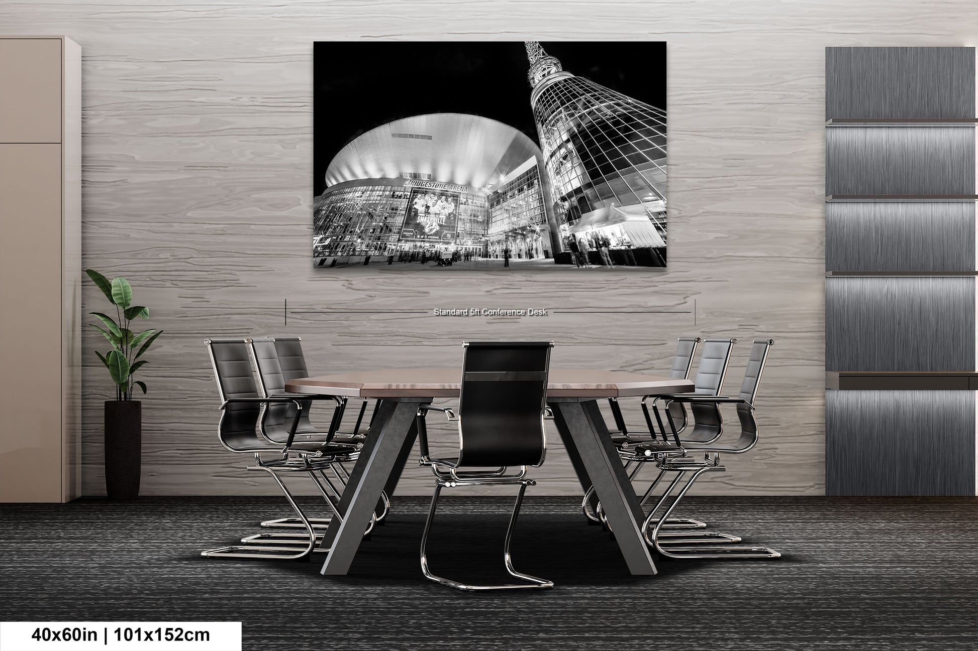 a black and white photo of a table and chairs