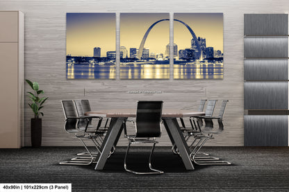 a dining room table with a view of the st louis skyline