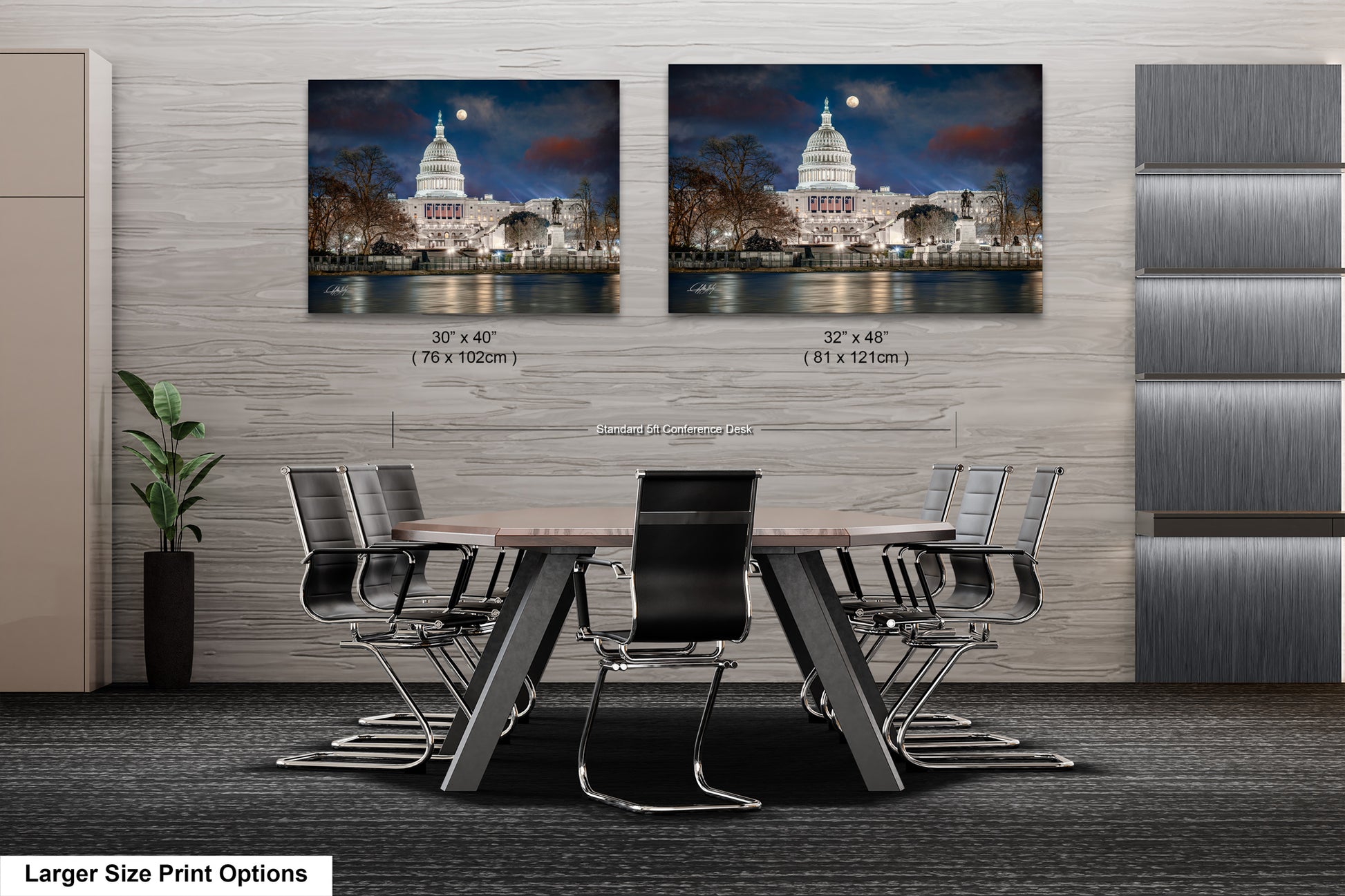 a dining room table with chairs in front of a wall with a picture of the
