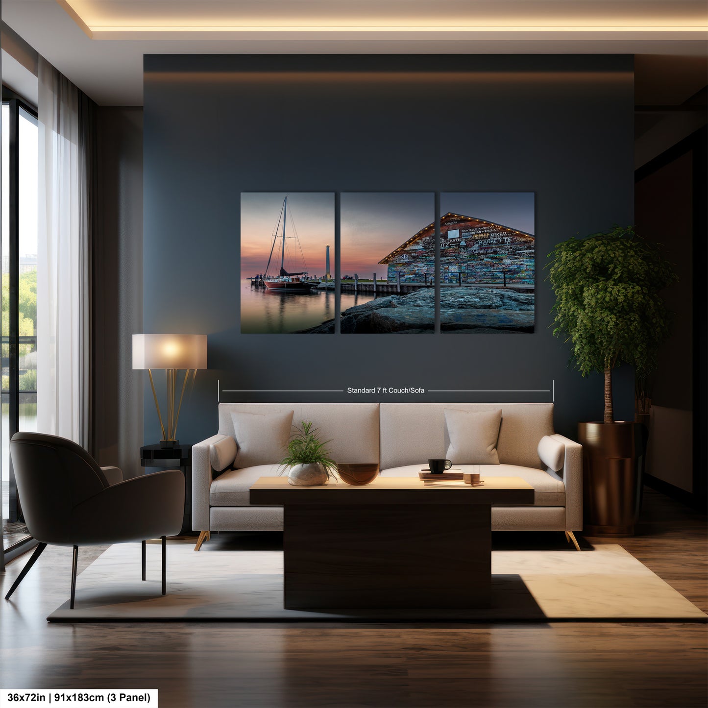 The image is a modern dining room with a large wall-mounted painting depicting a serene scene of a boat on a body of water at sunset. The painting is composed of three panels, each capturing different aspects of the serene landscape. The dining table is surrounded by four chairs, and a vase of flowers adds a touch of elegance to the room. The overall design and arrangement of the furniture and artwork create a harmonious and inviting atmosphere.