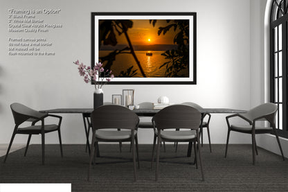 a dining room table with chairs and a vase of flowers