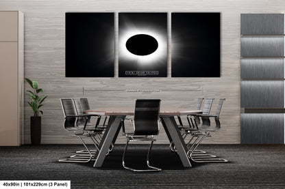 a black and white photo of a table and chairs