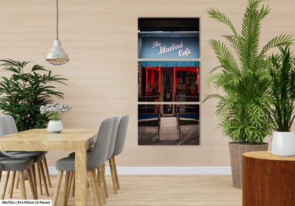 a dining room with a table and chairs
