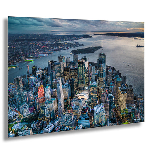 an aerial view of a city at dusk
