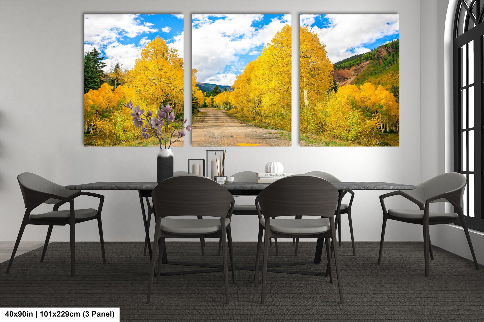a dining room with a table and four chairs