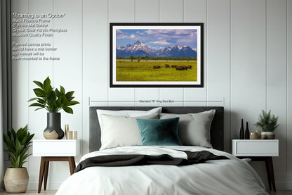 a bedroom with a large bed and a painting on the wall