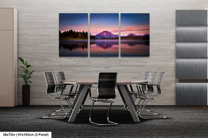 a dining room with a table and chairs