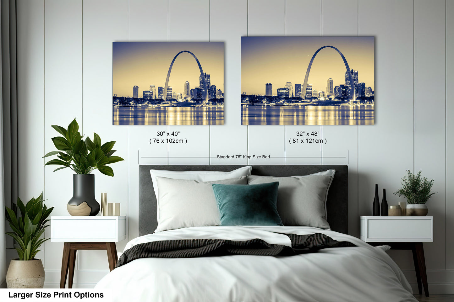 a bedroom with a large bed and a picture of the st louis skyline