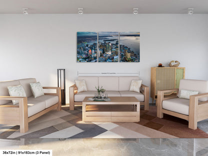 a living room filled with furniture and a painting on the wall