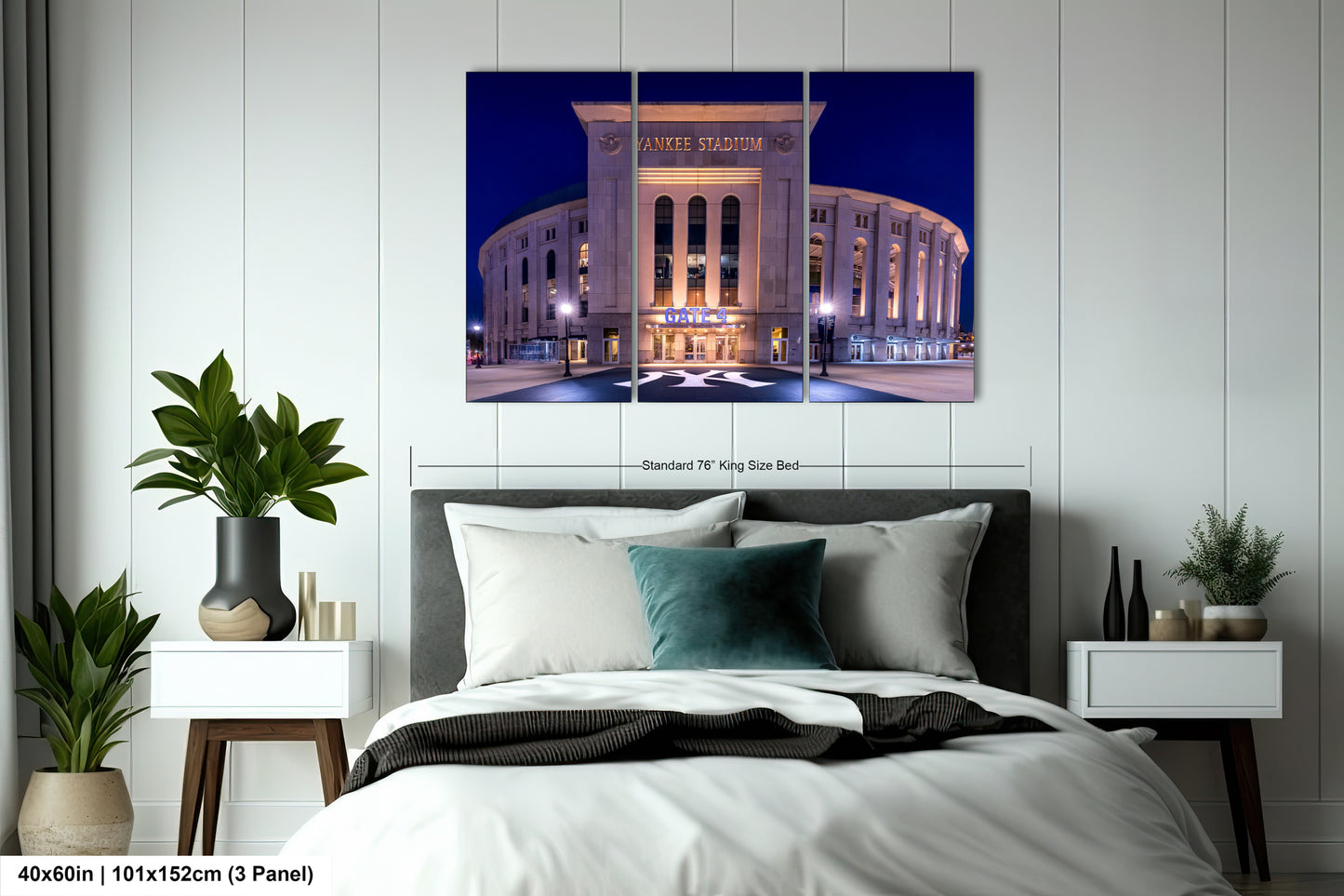 The image is a large, three-panel print of a building at night, specifically the Yankee Stadium in New York City.