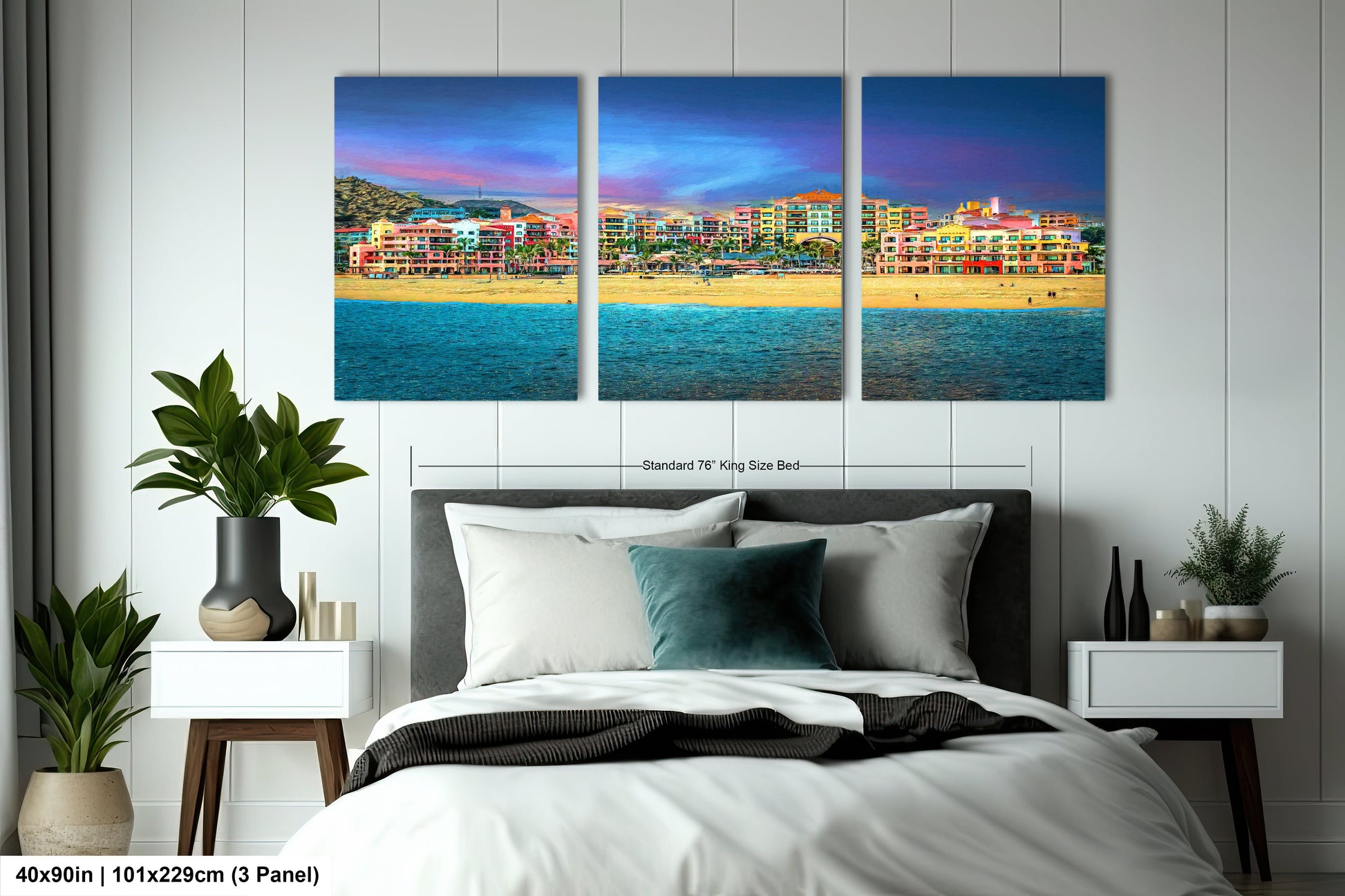 a bedroom with a bed and two paintings on the wall