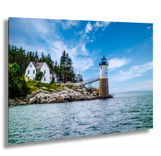 a picture of a lighthouse in the middle of a body of water