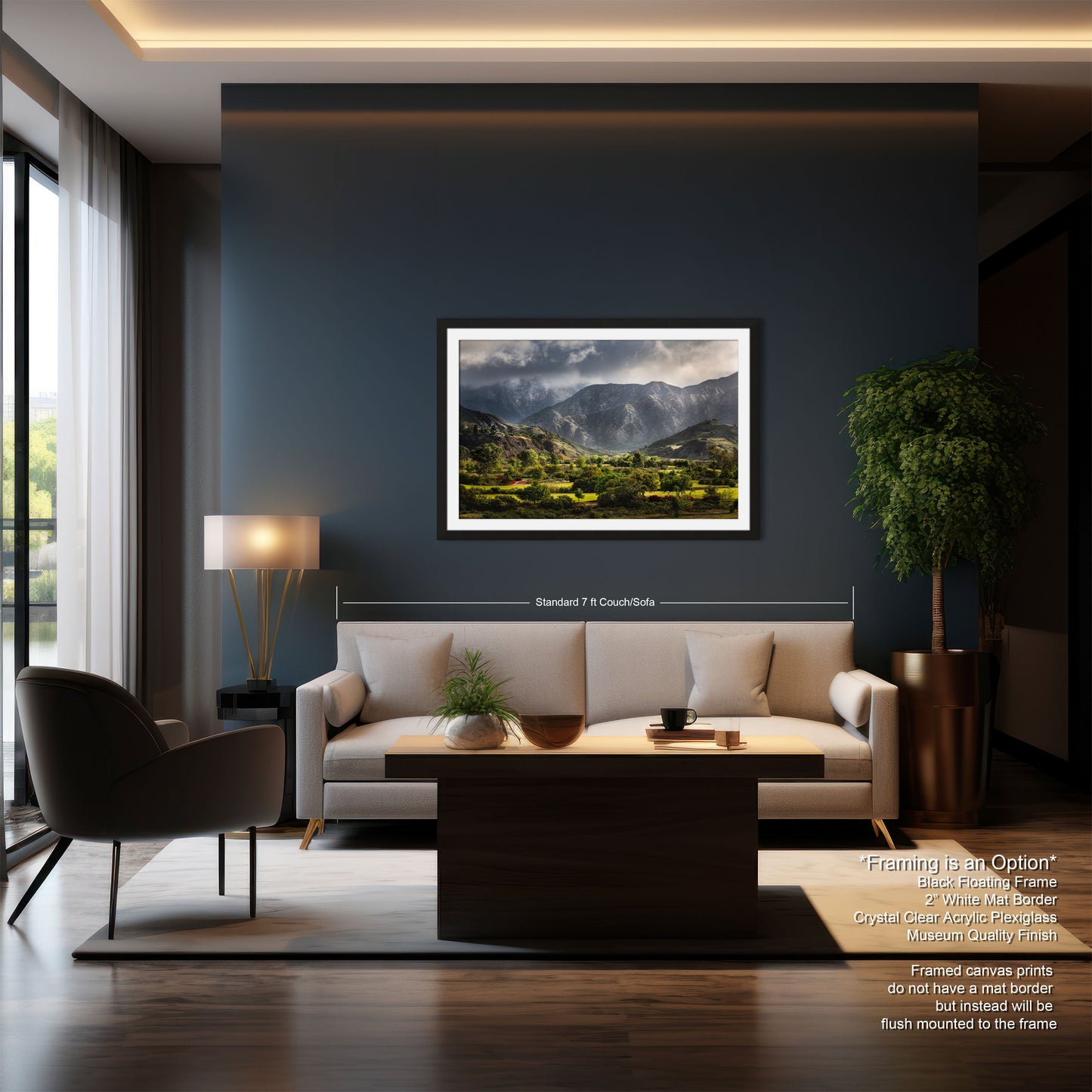 a living room with a couch a chair and a painting on the wall