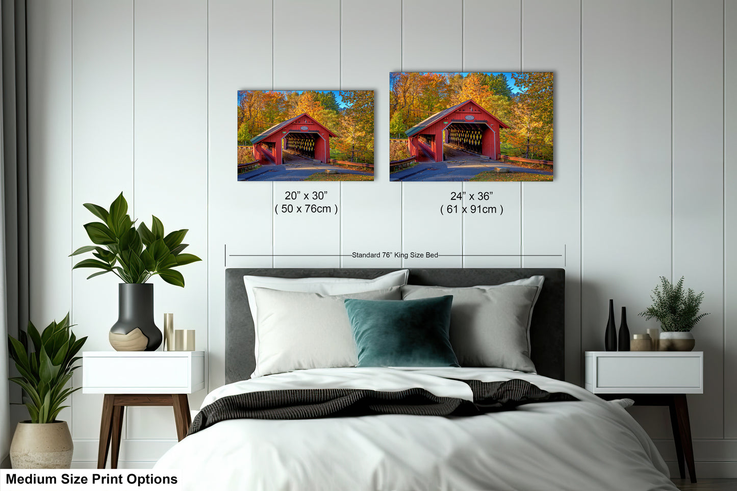 a bedroom with a bed and two pictures on the wall