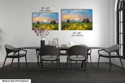 a dining room table with chairs and a vase of flowers