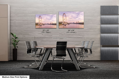 a dining room table with chairs and a picture of a ferris wheel