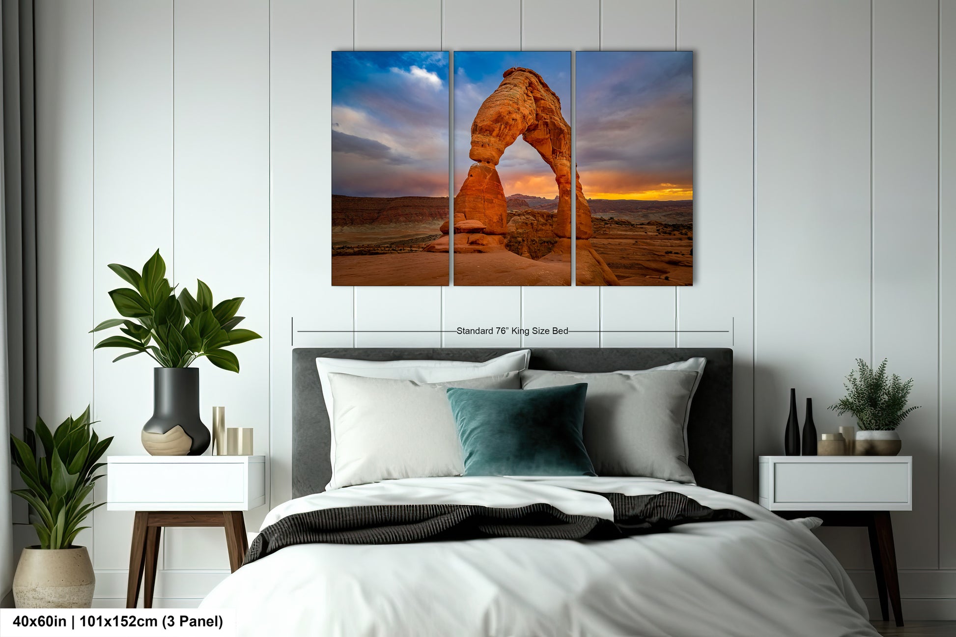 a bed room with a neatly made bed and a painting on the wall