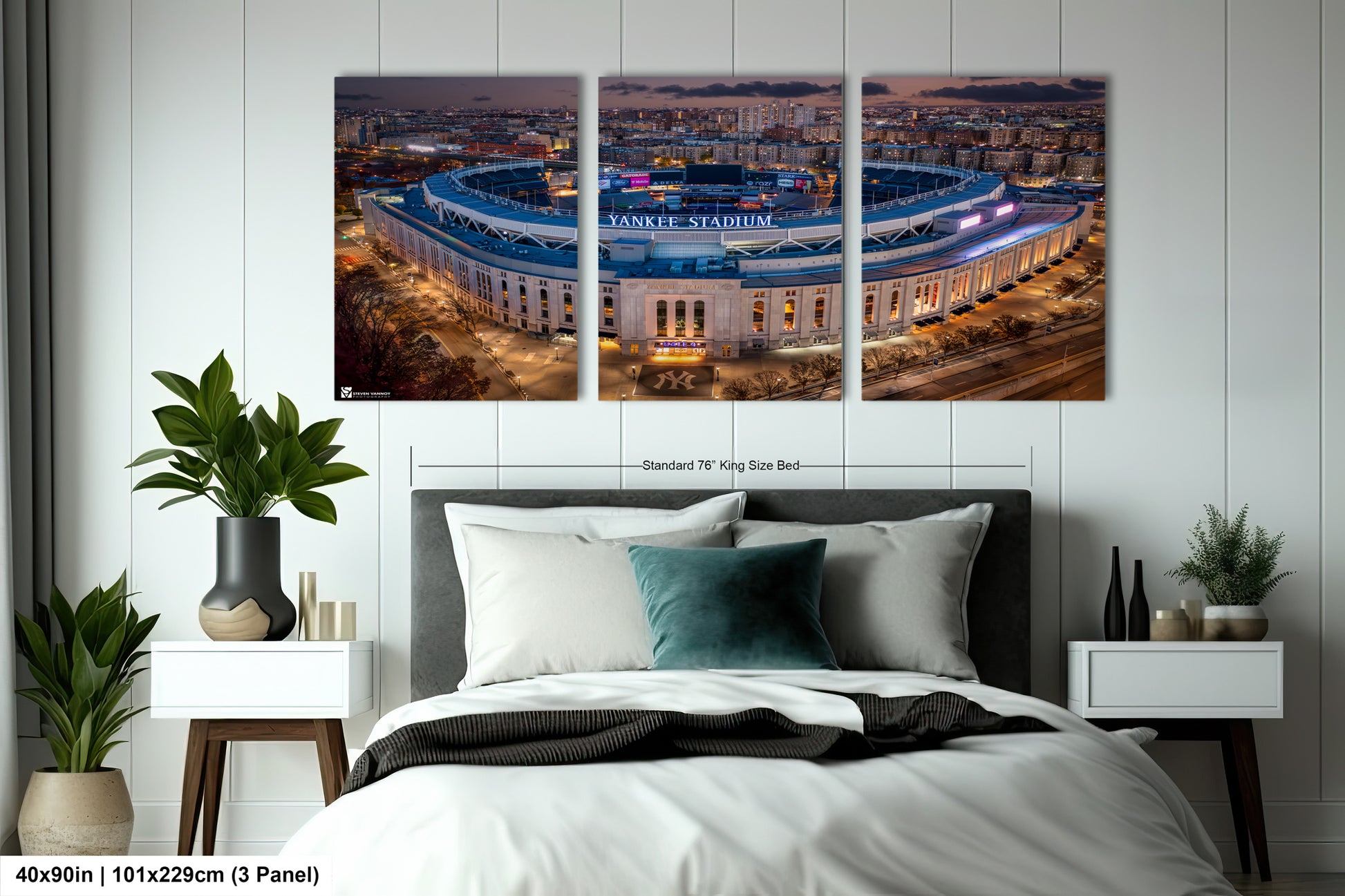 a bed room with a neatly made bed and two pictures on the wall