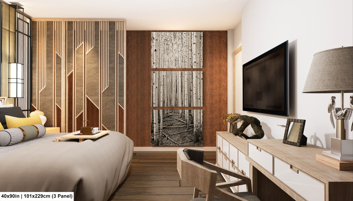 a bed room with a neatly made bed and a flat screen tv