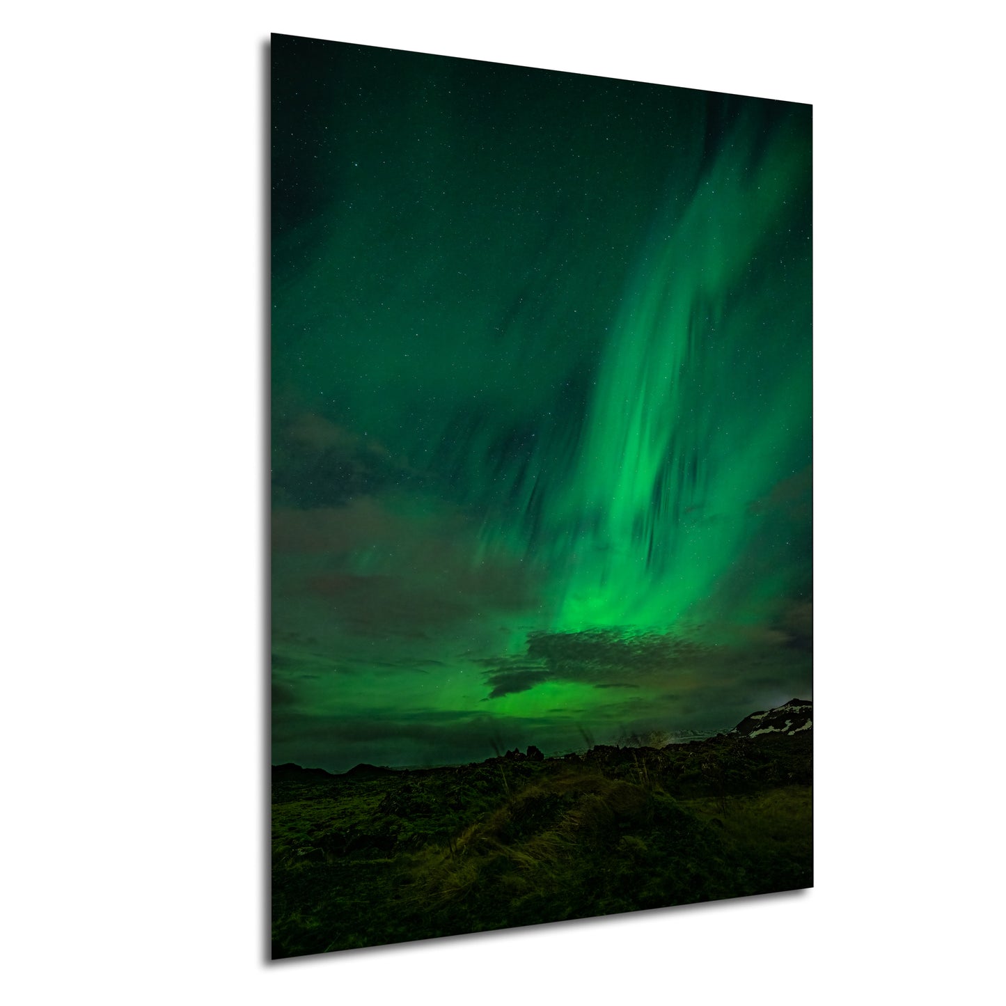 a stunning night sky filled with vibrant green and blue hues, showcasing the mesmerizing aurora borealis or northern lights.