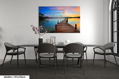 a dining room table with chairs and a painting on the wall