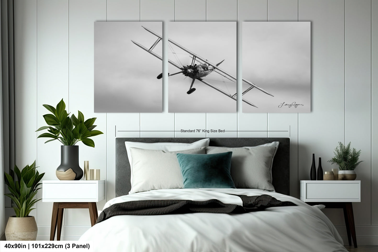 a black and white photo of a plane flying over a bed