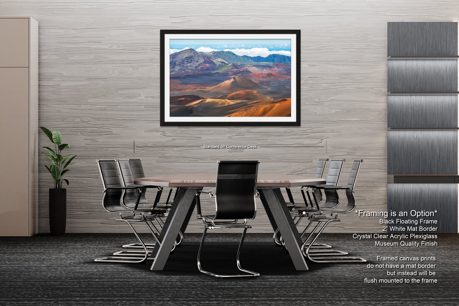 a modern office space with a large framed landscape painting hanging on the wall above a wooden table surrounded by black chairs.