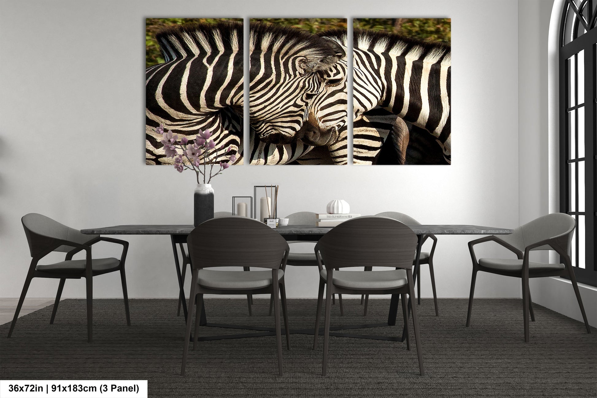a couple of zebra standing next to each other