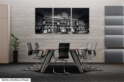 a black and white photo of a dining room table