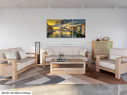 a living room filled with furniture and a painting on the wall