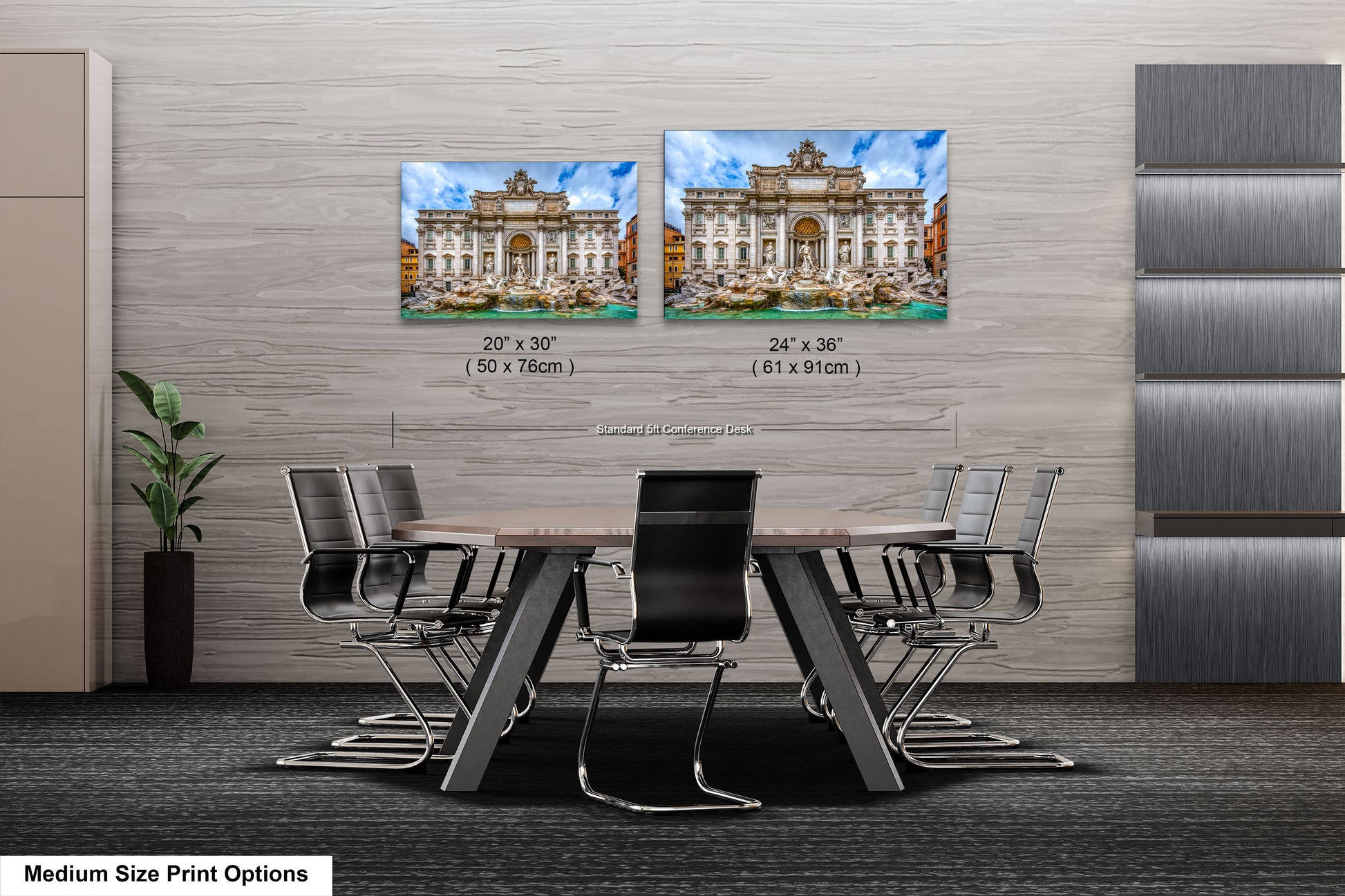 a dining room table with chairs and two pictures on the wall