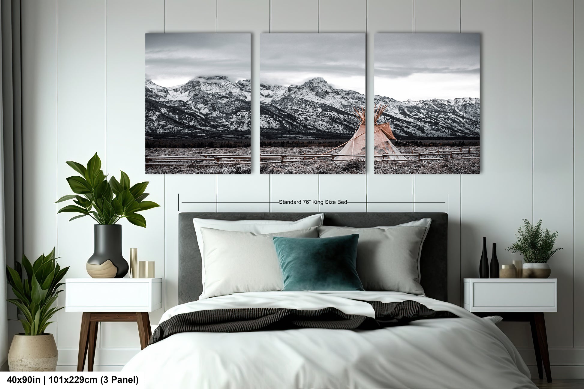 a bedroom with a bed and two pictures on the wall