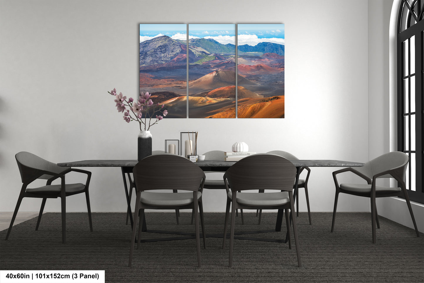 a modern dining room with a large, colorful landscape painting hanging on the wall above a black table surrounded by six chairs.