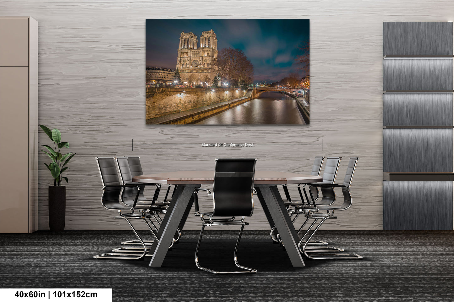 a dining room table with chairs and a painting on the wall