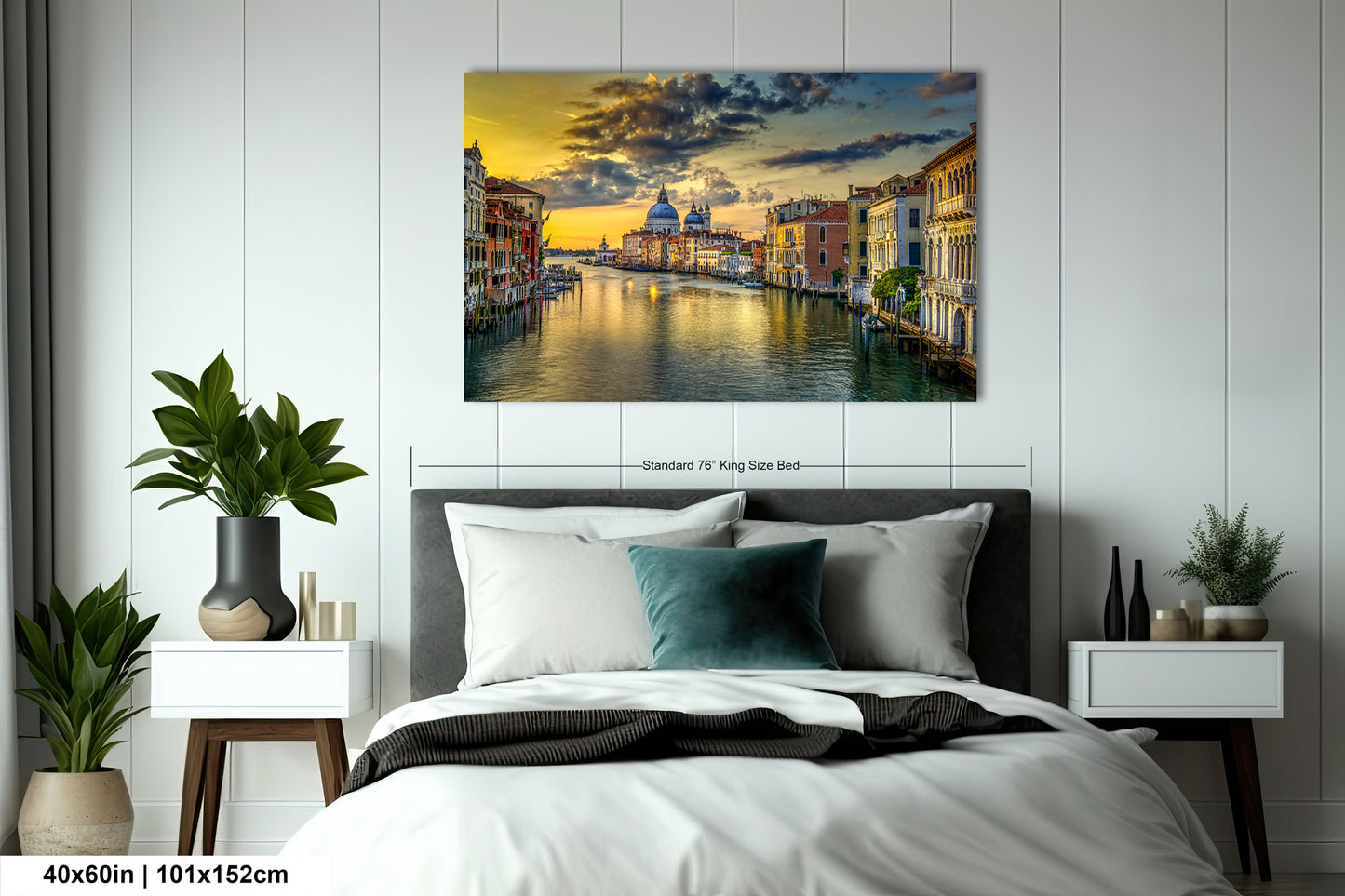 a bedroom with a bed and a painting on the wall