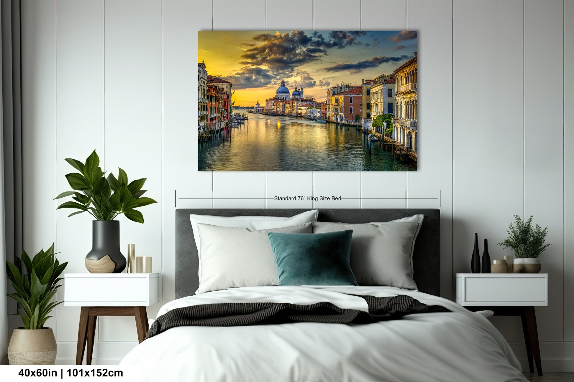 a bedroom with a bed and a painting on the wall