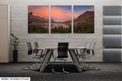a dining room with a table and chairs