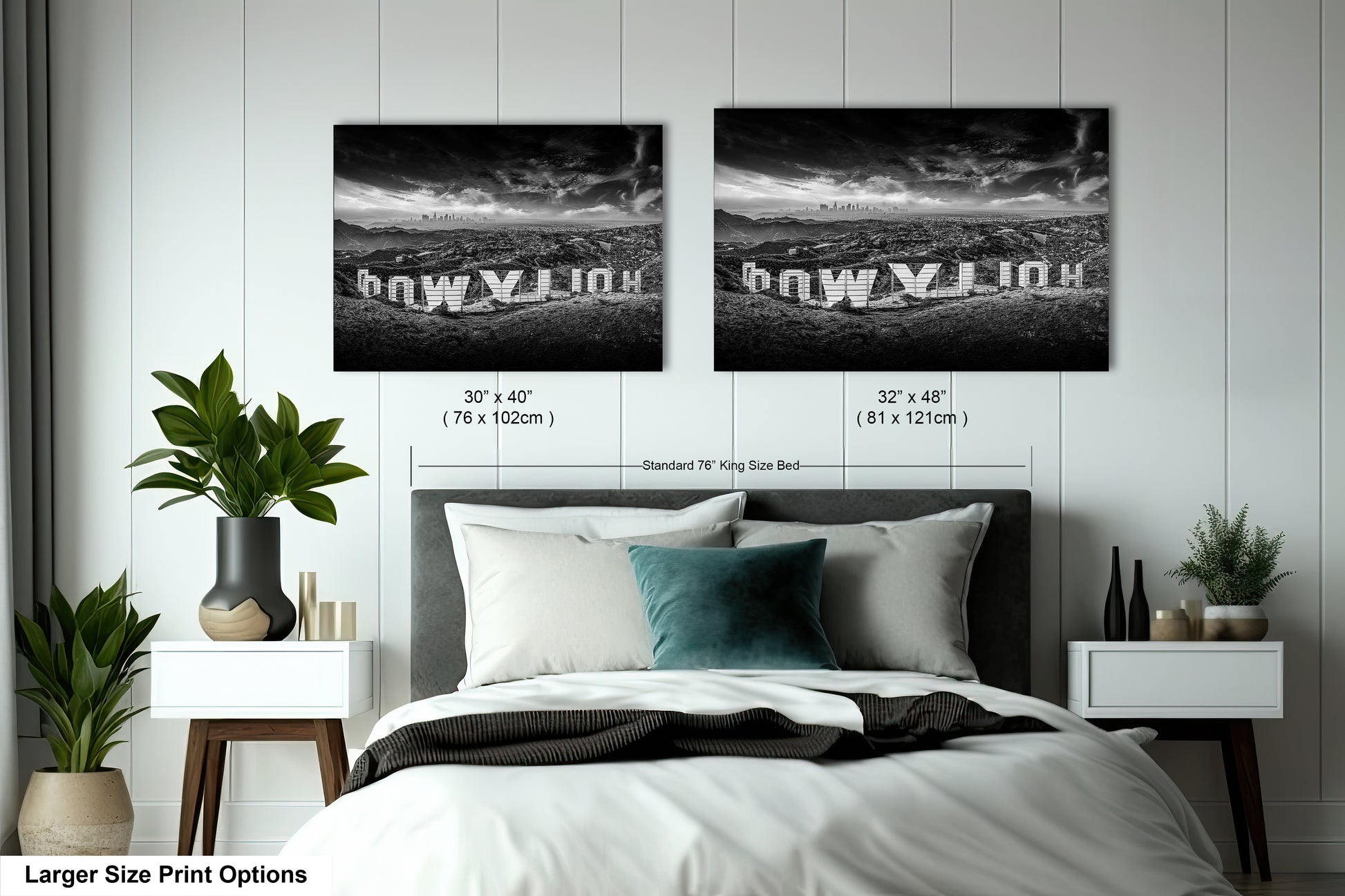 a bedroom with a bed and two pictures on the wall